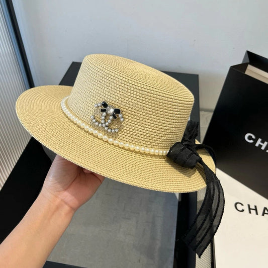 FLAT STRAW HAT WITH BOW BLACK 673921