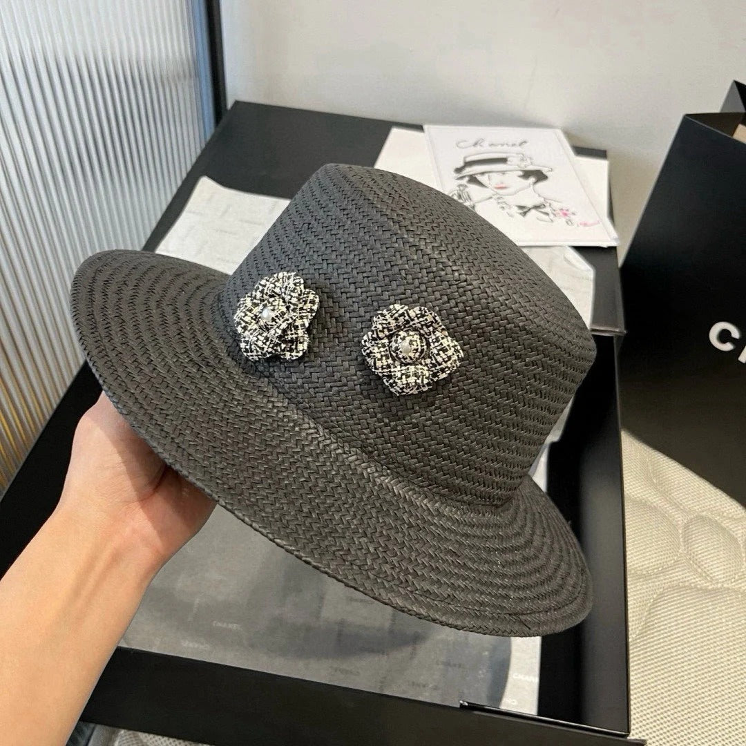 FLAT STRAW HAT BLACK FLOWER ATTACHMENT 673929
