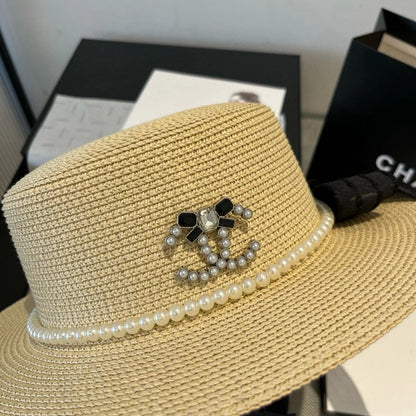 FLAT STRAW HAT WITH BOW BLACK 673921